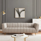 Szara trzyosobowa sofa skórzana pikowana w stylu połowy wieku