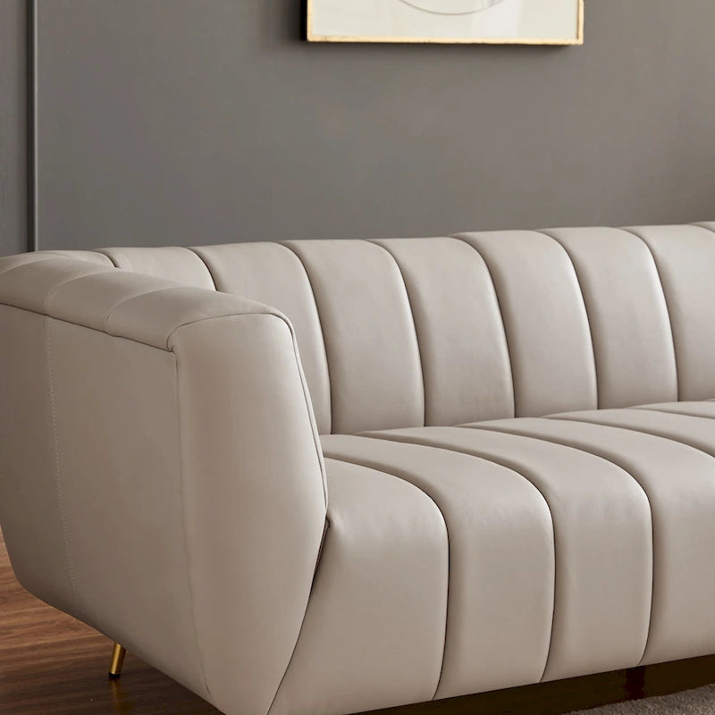 Szara trzyosobowa sofa skórzana pikowana w stylu połowy wieku