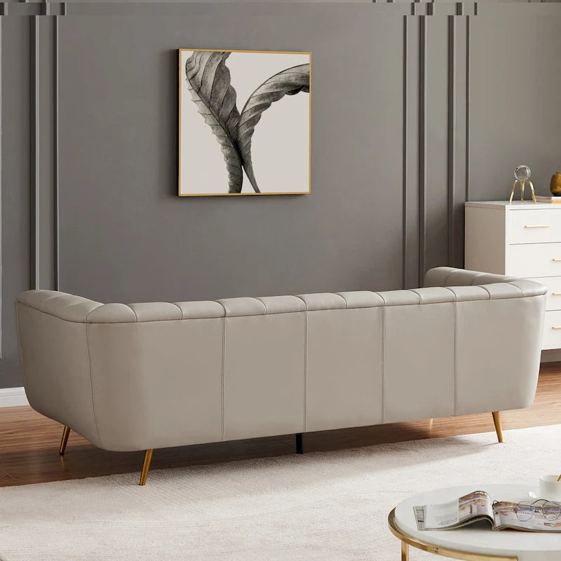 Szara trzyosobowa sofa skórzana pikowana w stylu połowy wieku